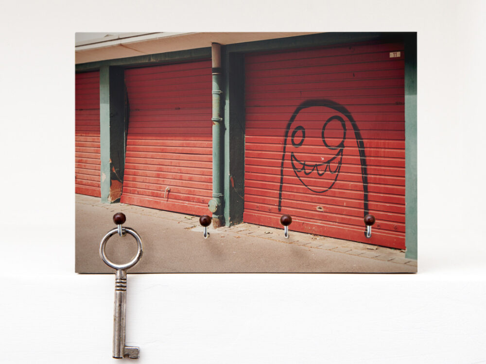 Schlüsselbrett Garagenmännchen aus eigener Fotografie von Frau Plonka