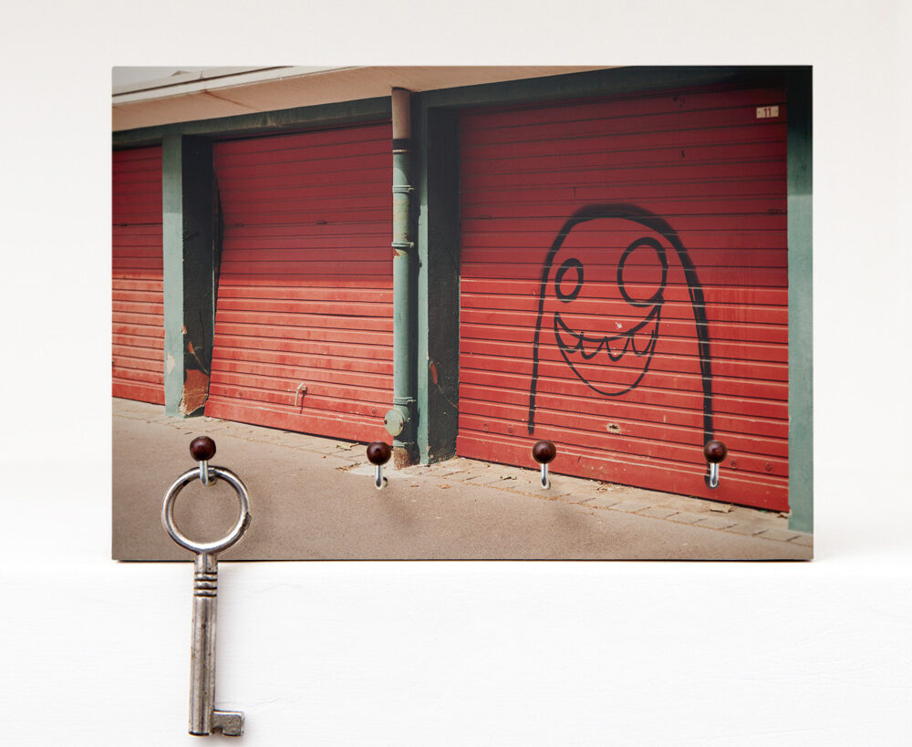 Schlüsselbrett Garagenmännchen aus eigener Fotografie von Frau Plonka