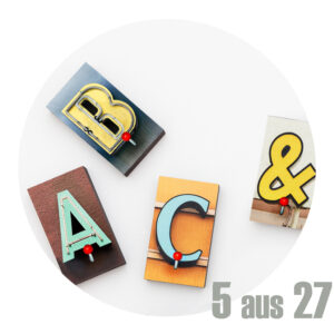 5 Buchstaben mit Häkchen